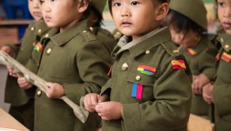 Children learn while wearing military clothing